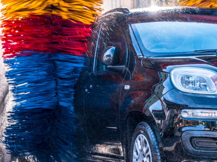 Car going through an automated car wash machine